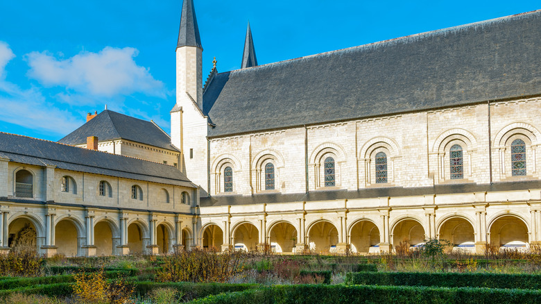 Abbey of Fontevraud cloister with limestone arches of the abbey