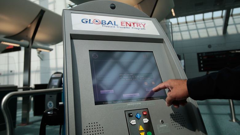 a Global Entry kiosk at an airport
