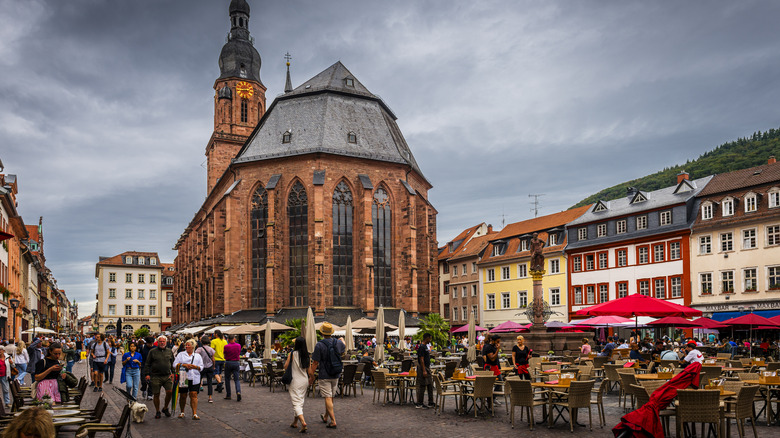 Tables and people around the Church of the Holy Spirit, Heidelberg