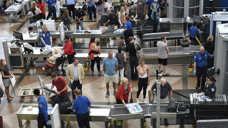 People in a slow-moving TSA security checkpoint