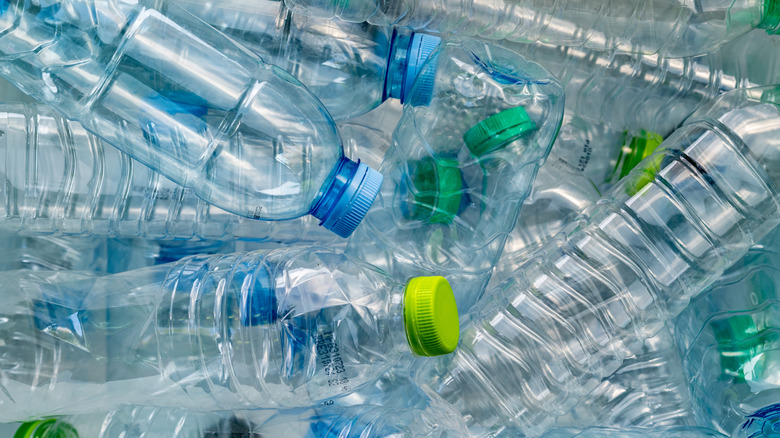 Close-up of a pile of discarded plastic water bottles