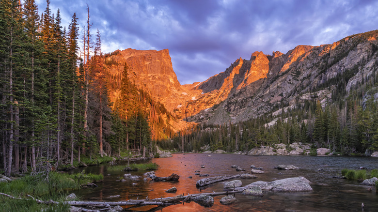 Morning Alpenglow on Hallett Peak and Flattop Mountain reflected in Dream Lake at sunrise in Rocky Mountain National Park, Estes Park, Colorado