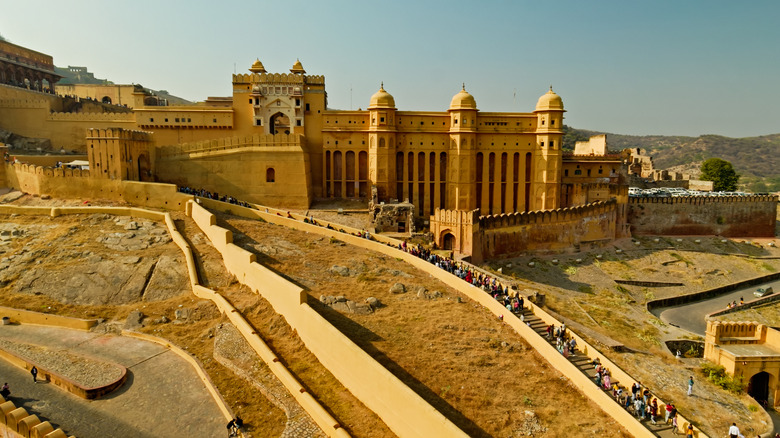Aerial view of the Amber Fort with crowds walking along