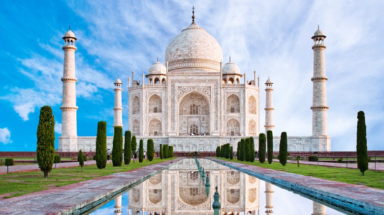 Front of Taj Mahal reflected into pool