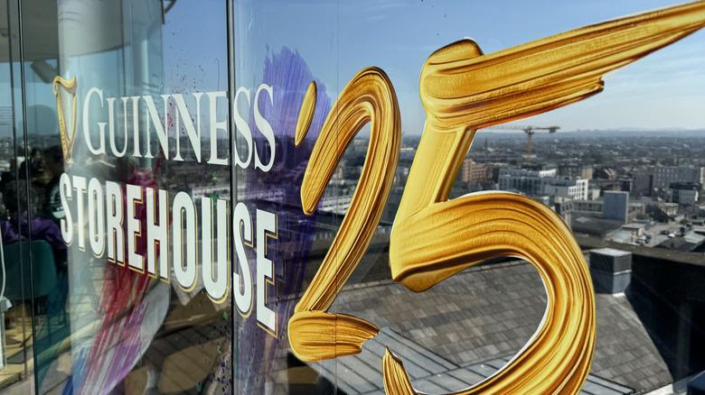 View from the Gravity Bar at the Guinness Storehouse on a sunny day in 2025, with an aerial view of Dublin out the window