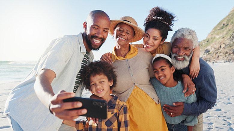 A multigenerational family enjoying the day on a beautiful beach