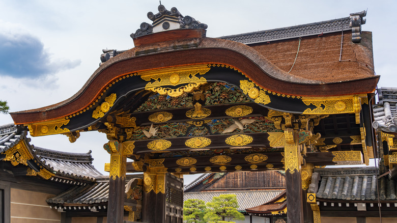 Gilt, ornate gate at Nijo Castle, the former shogun base in Kyoto, Japan