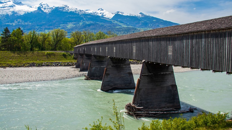 The Alte Rheinbrücke strecthing over the Rhine River between Switzerland and Liechtenstein