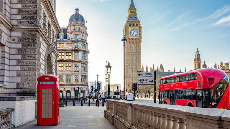 Red telephone box and double-decker bus with Big Ben in the background