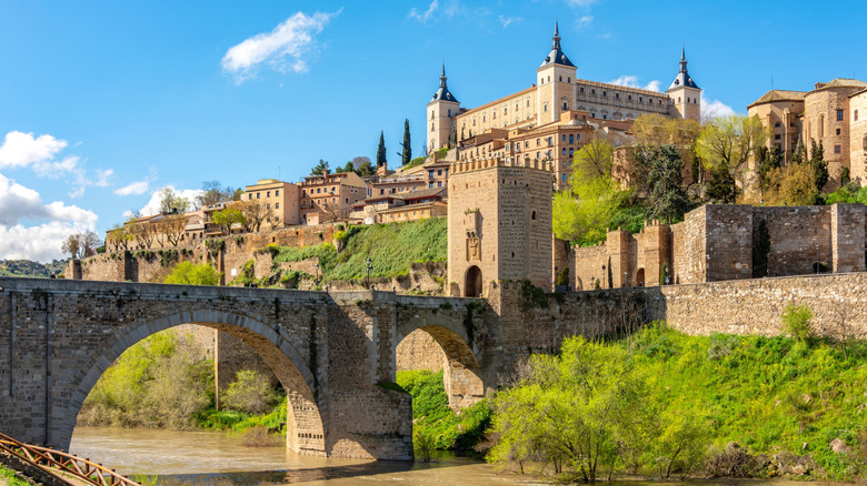 Alcazar of Toledo overlooking a river in Spain
