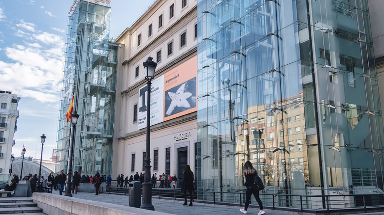 exterior of Museo Reina Sofía with glass and concrete on a clear day