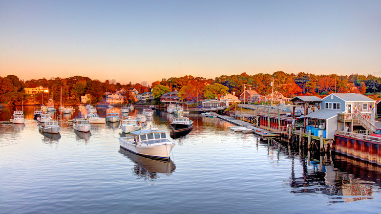 Boats in a tiny harbor at fishing village in Maine, USA