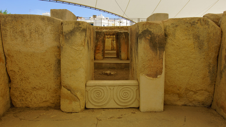 Stone megaliths and carvings in the ancient temple site of Ħal Tarxien