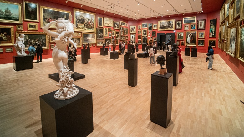 Interior view of the National Gallery of Victoria (NGV) in Melbourne with visitors admiring the exhibit