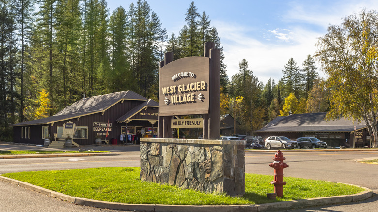 A sign welcomes visitors to West Glacier Village