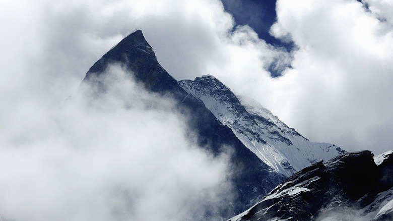 Machhapuchhare obscured by clouds.