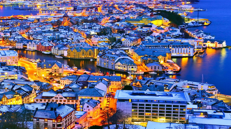 View of Alesund, Norway at night in winter.