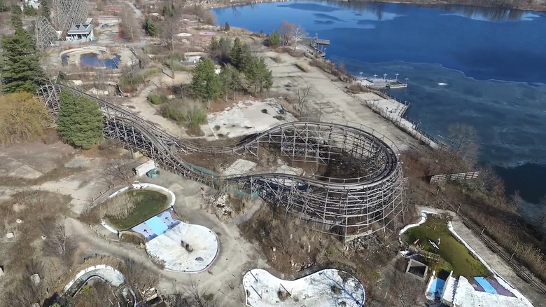 Aerial view of abandoned rollercoaster at the edge of Geauga Lake in early spring.