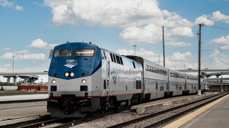 The Heartland Flyer train pulling out of Fort Worth Central Station on a sunny day.