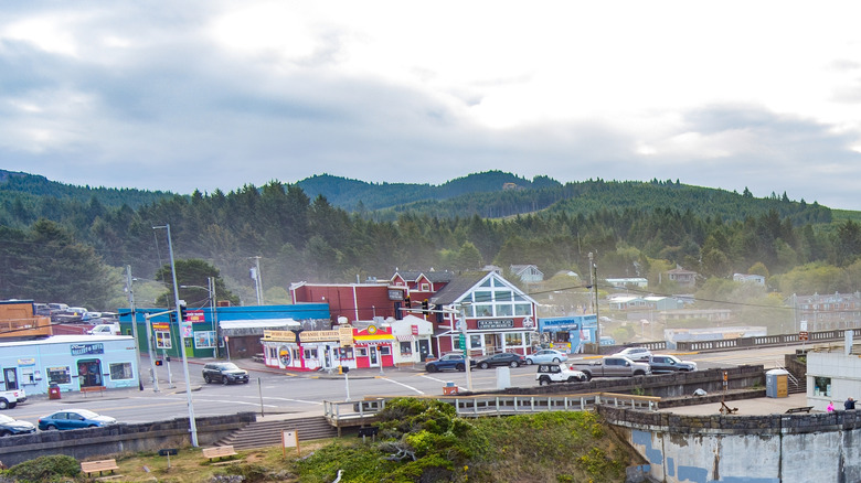 Aerial view of the Depoe Bay downtown cityscape along Highway 101 on an overcast day.