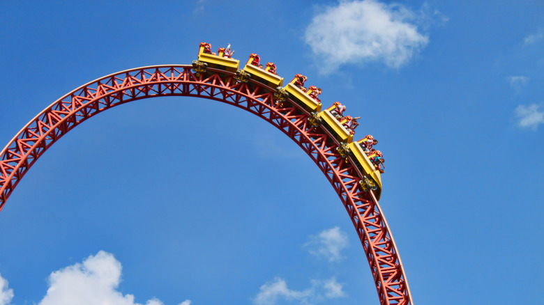 Close up of roller coaster at Hersheypark as riders descend a steep drop.