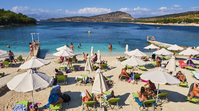Ksamil Beach with umbrellas on the sand