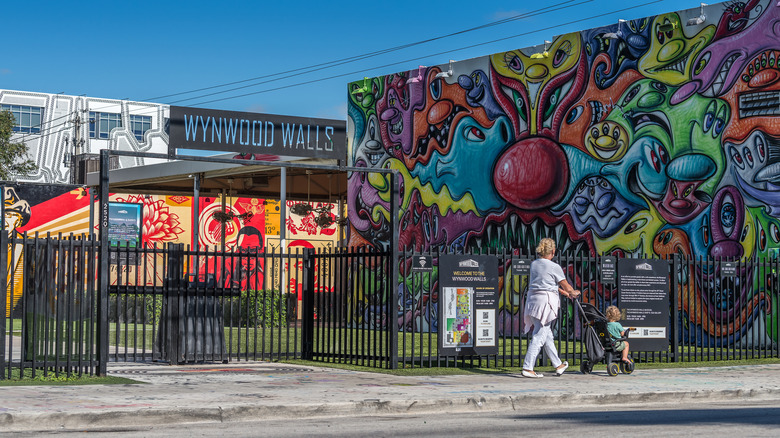 View of brightly colored murals at the open-air Wynwood Walls street art and graffiti museum in Miami, Florida