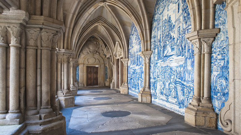 Grey stone cloister with blue and white azulejo tiling