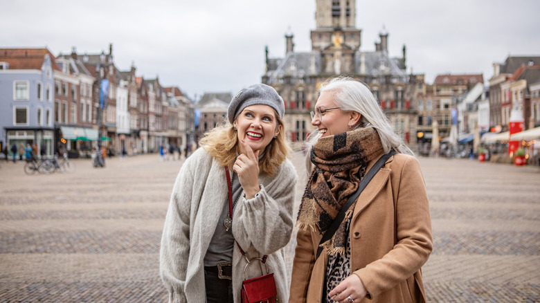 Two travelers visiting Delft in the winter