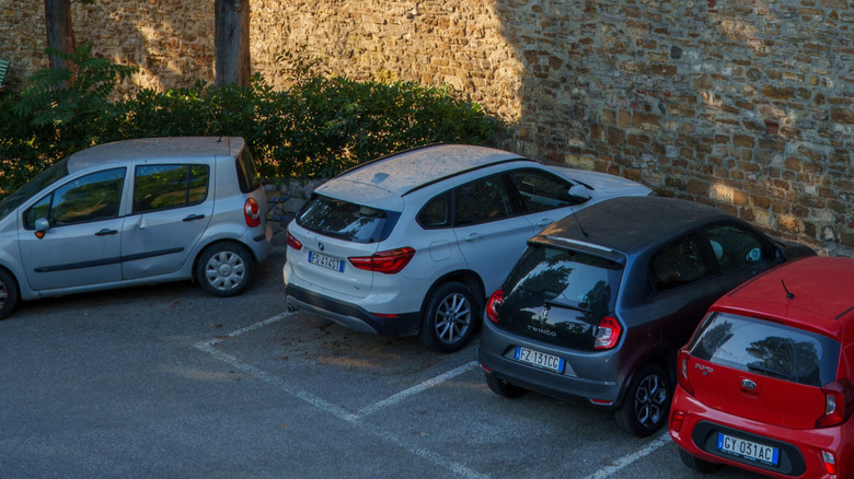 Cars in a park-and-ride lot in Tuscany