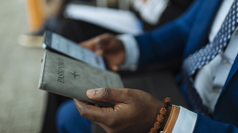 Person holding a passport