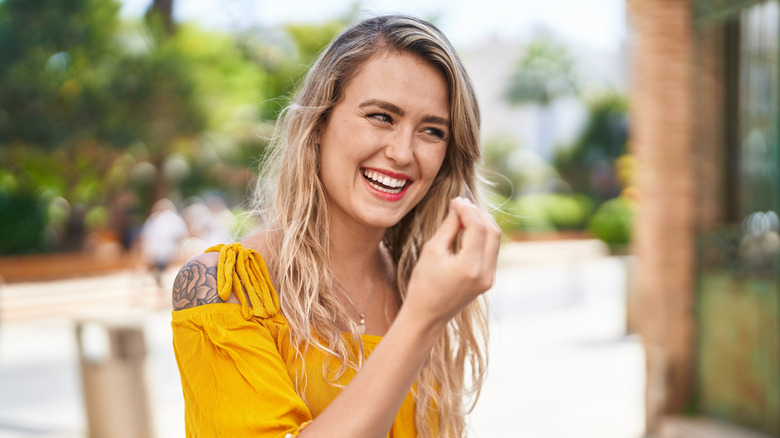 Woman using the "hand purse" gesture in Italy