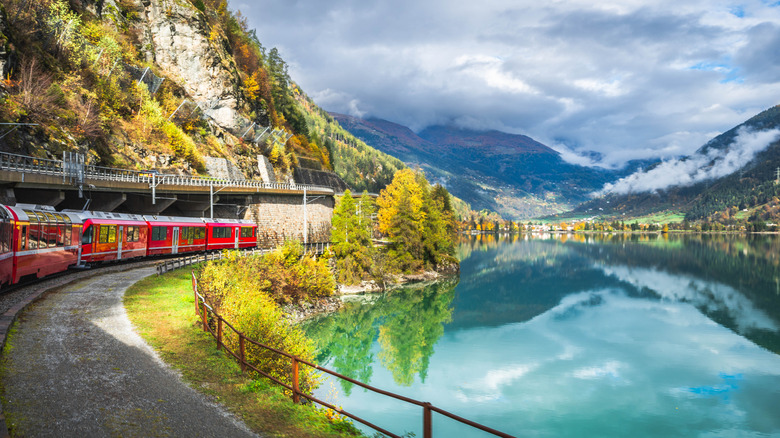 Bernina Express trail through Lake Miralago in Switzerland