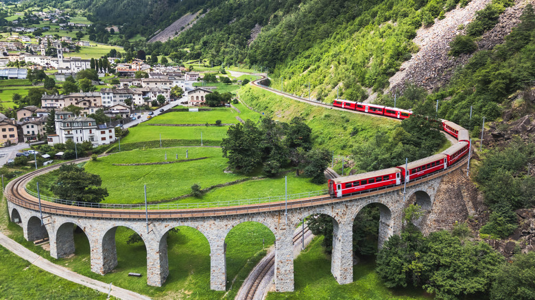 The Bernina Express train through Grisons canton, Switzerland.