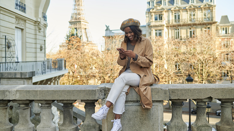 Person on their phone in Paris