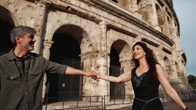 Couple dressed in neutral colors in Rome