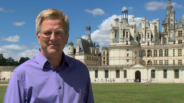 Rick Steves standing outside Château de Chambord