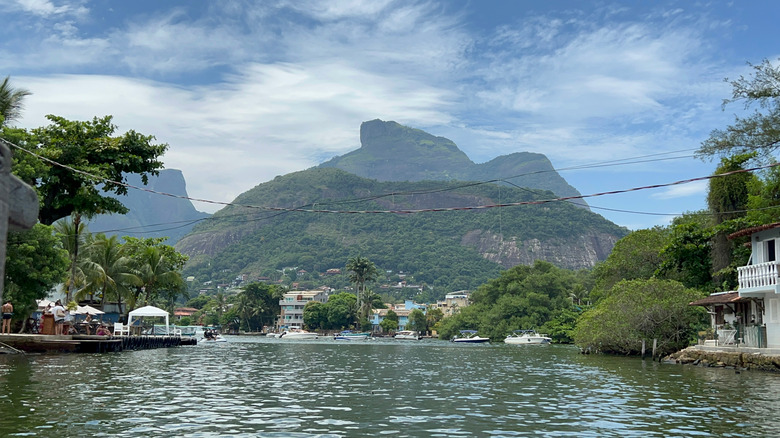 Boats floating on peaceful waters surrounding Ilha da Gigóia