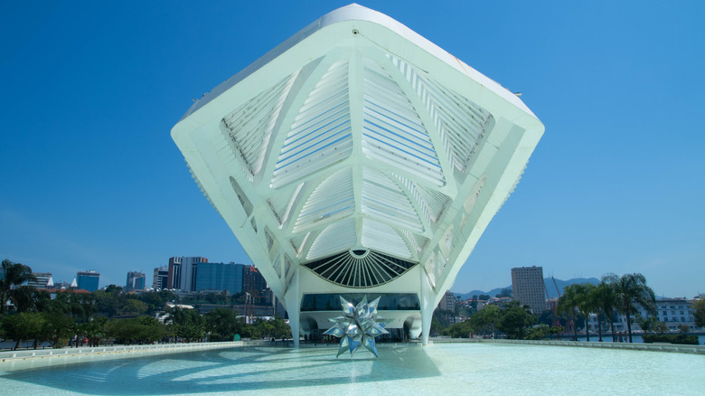 The exterior of the Museu do Amanhã against clear blue skies