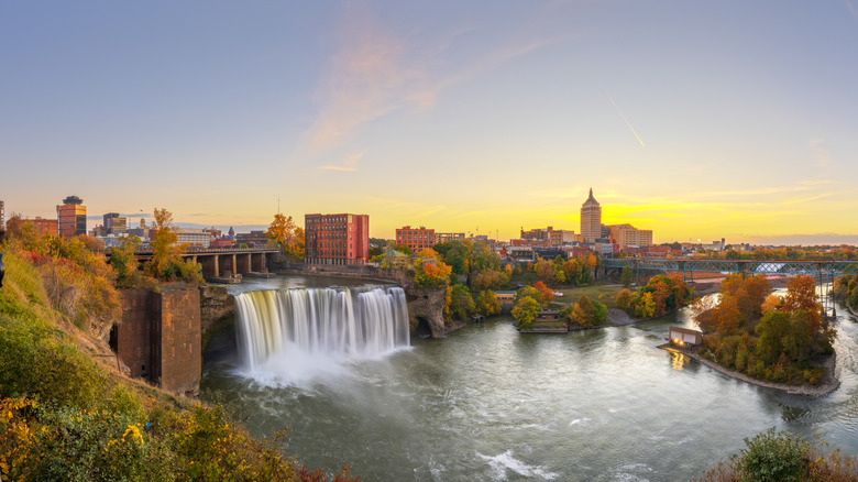 Wide angle panoramic view of downtown Rochester and High Falls at sunset.