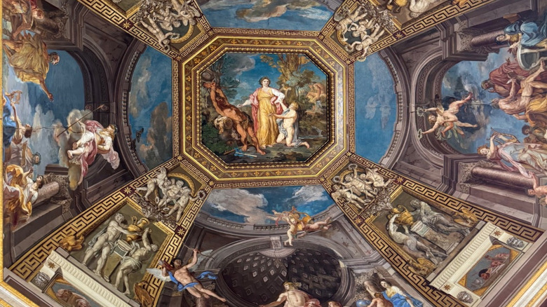 Tommasco Conca's painting ceiling vault at the Vatican Museums featuring Renaissance art