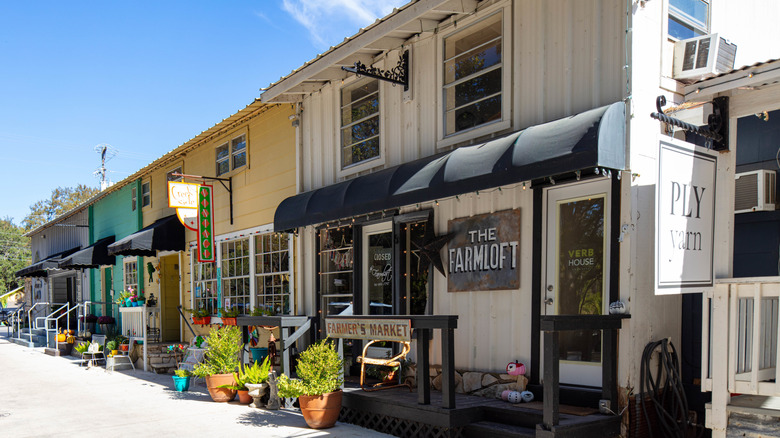 the outside of small shops at Wimberley Square in Wimberley, Texas