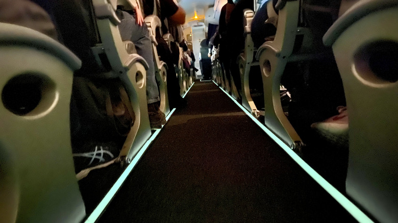 Exit path strips glow in the dark aboard an aircraft.