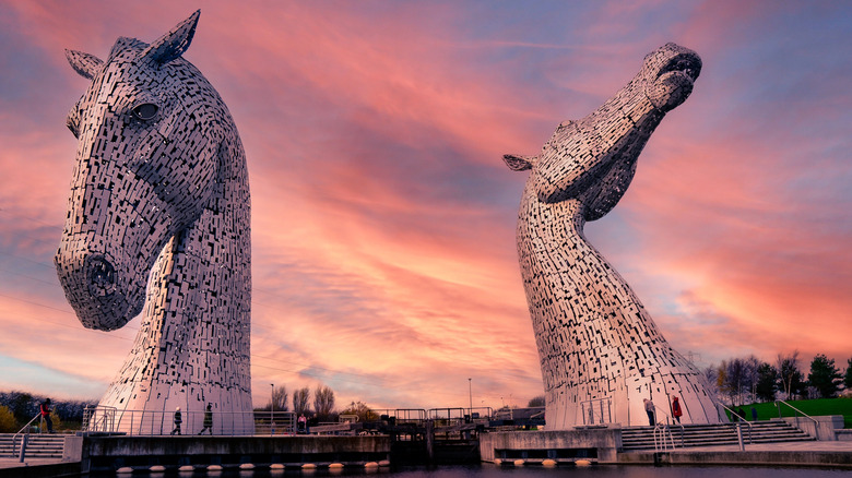 The Kelpies horse head sculptures at sunset