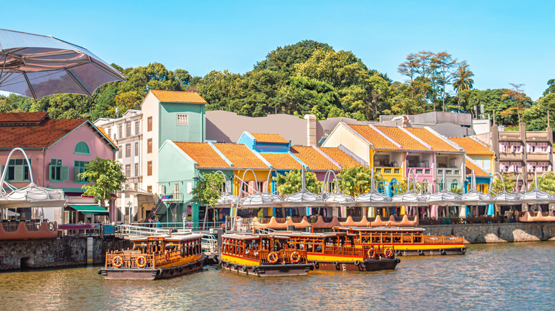 Cruise boats docked in Clarke Quay on a sunny day