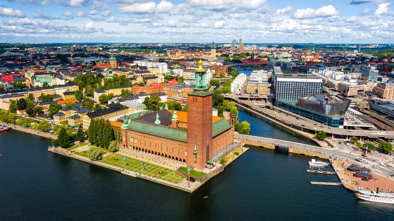 An aerial view of Stockholm City Hall amid the skyline