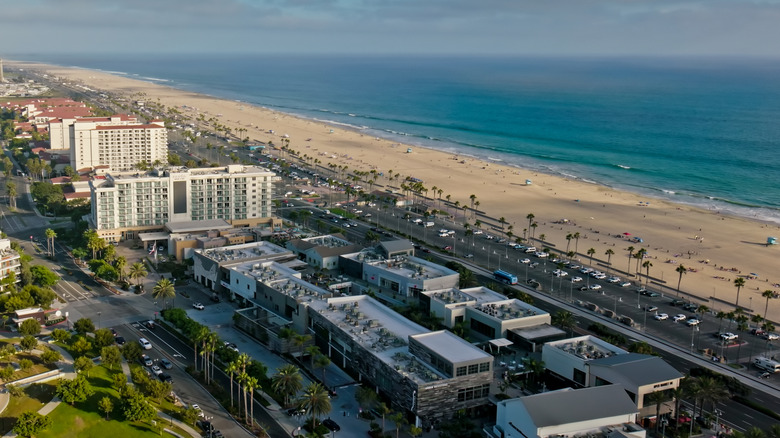 The Pacific Highway and hotel resorts in Huntington Beach, California, from above