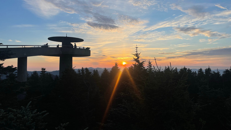 View of the observatory at Clingmans Dome/Kuwohi in the Great Smoky Mountains during a brilliant orange and purple sunrise