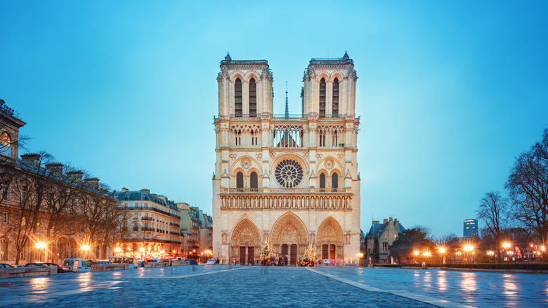 Front facade of Notre-Dame Cathedral at sunset