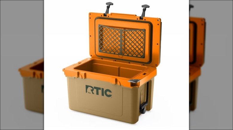 A brown and orange RTIC UltraLight hard-sided cooler